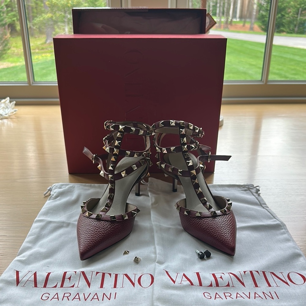 Valentino Garavani Red / Maroon Rockstud Heels. Grainy leather